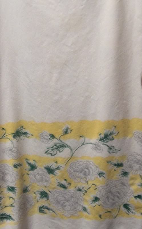 White tablecloth with pale yellow border
