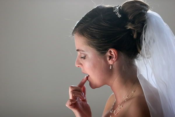 IMAGE: http://i15.photobucket.com/albums/a358/gahla/jakekamilawedding-14.jpg