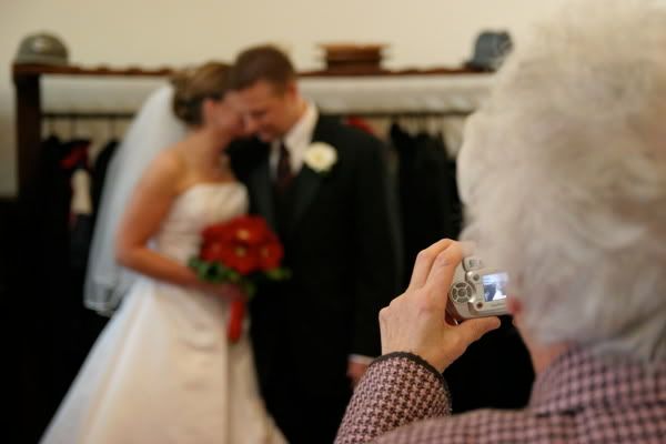 IMAGE: http://i15.photobucket.com/albums/a358/gahla/jakekamilawedding-26.jpg