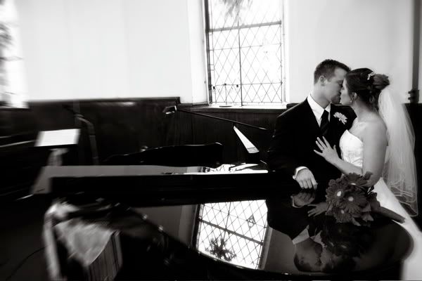 IMAGE: http://i15.photobucket.com/albums/a358/gahla/jakekamilawedding-31.jpg