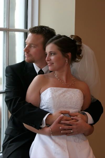 IMAGE: http://i15.photobucket.com/albums/a358/gahla/jakekamilawedding-35.jpg