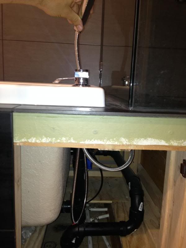 How can I avoid a leak from hidden flexible Handheld showerhead hose in