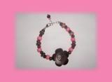Pink coconut bead bracelet with tropical flower