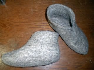 A pair of felt ankle boots.