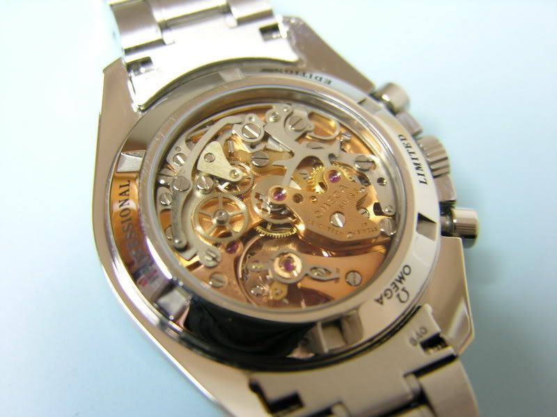 http://i15.photobucket.com/albums/a374/jmsrolls/watches/PW2/movement.jpg