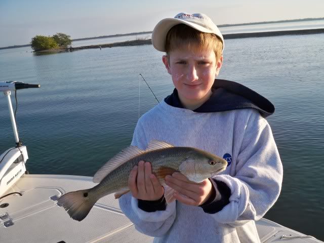 young man with redfish