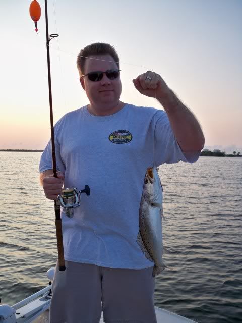 man with sea trout