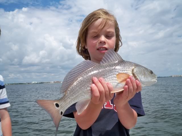boy with redfish