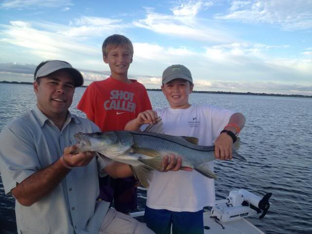 Bowman holding his 33" snook photo 017_zpsef34fea3.jpg