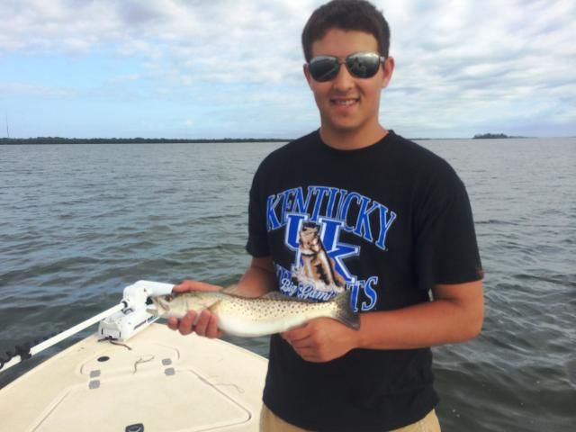 Clay with his first sea trout photo 002_zps39b3bd6e.jpg
