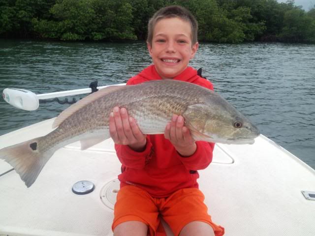 Emmett's nice redfish....and smile! photo 002_zpscd99c20e.jpg