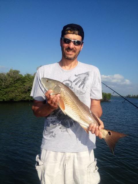 Justin with a nice redfish photo 019_zps80180338.jpg