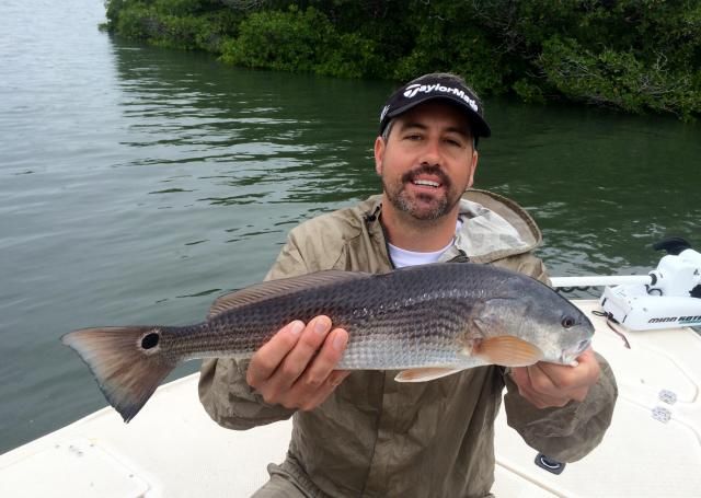 Mike with his first redfish photo IMG_2570_zpsa07b3931.jpg