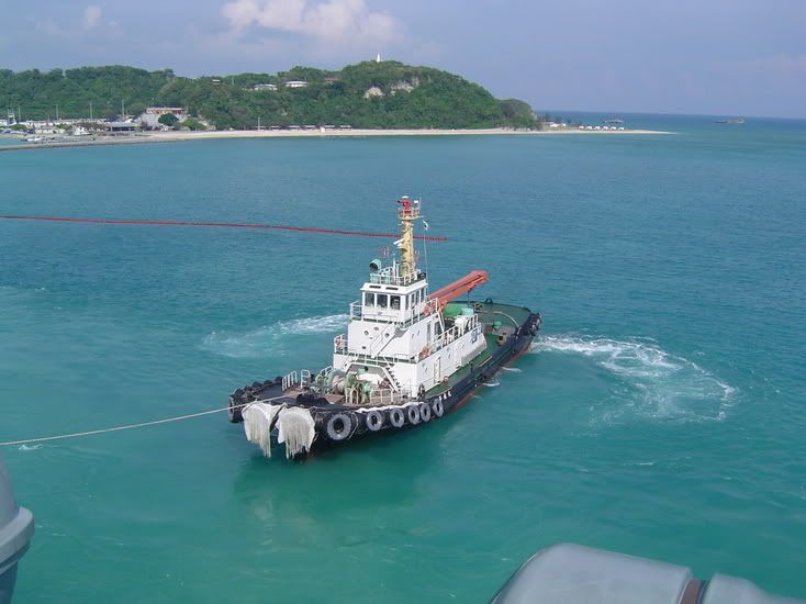IMAGE: http://i15.photobucket.com/albums/a378/speedy_3/Tugboatpullingtheshipout.jpg