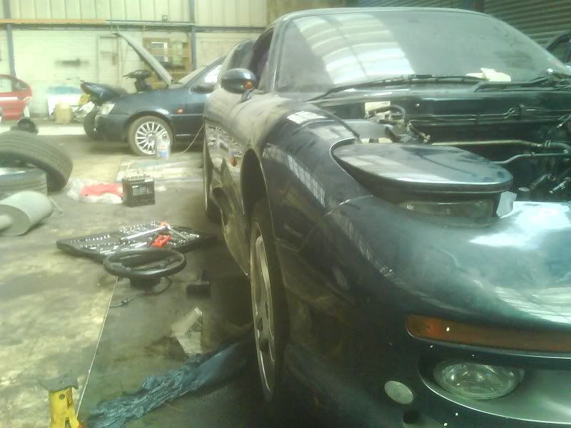 http://i15.photobucket.com/albums/a390/tooleyrx7/rxdowntheside.jpg