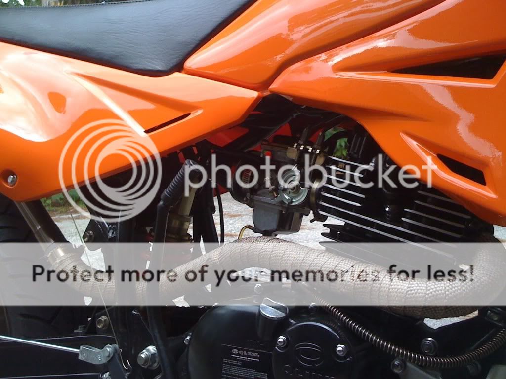 I am happy with the look and simplicity of the little filter vs. the  airbox....not to mention the filter inside upon inspection wasnt really  sealing very ...